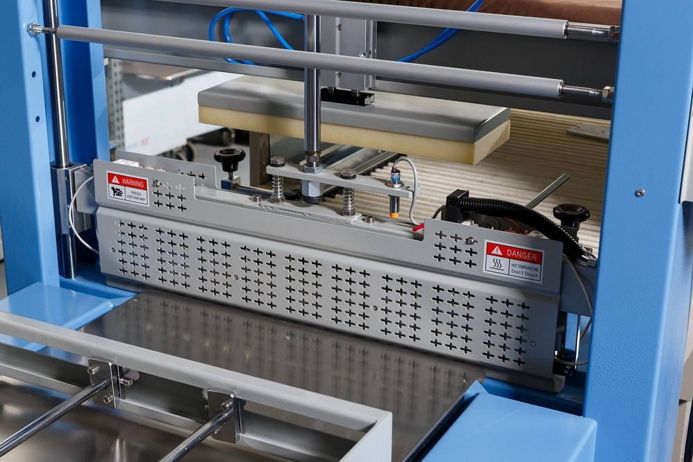 Фото Машина термоусадочная Hualian Machinery TF-6540SA 3