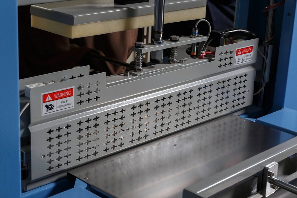 Фото Машина термоусадочная Hualian Machinery TF-6540SA 5